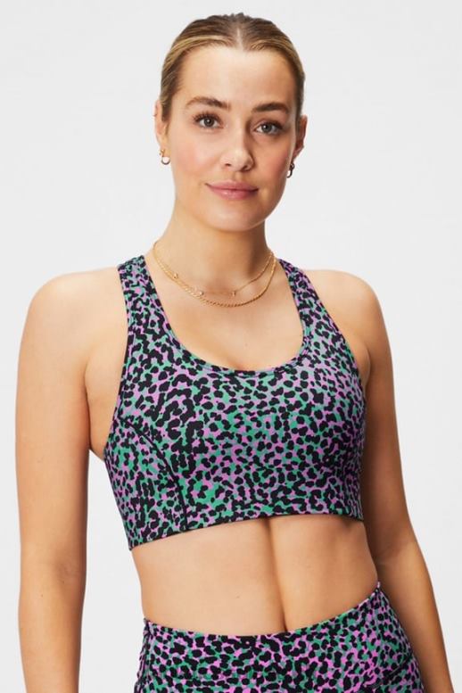 femmes soutien-gorge de sport à impact moyen en déplacement 112 B0B6R1740 taches de safari vert herbe/noir Fabletics